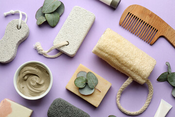 Flat lay composition with pumice stones on violet background