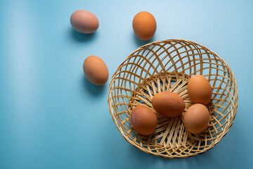 Group eggs in a rattan basket