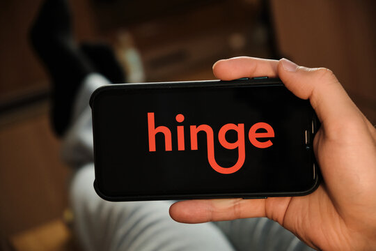 Hinge Logo On The Smartphone Display. Man Uses An Application For Dating And Looking For The Partner, June 2021, San Francisco, USA