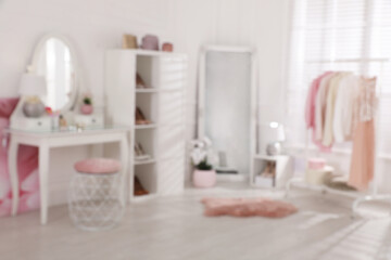 Obraz na płótnie Canvas Blurred view of stylish dressing room. Interior design