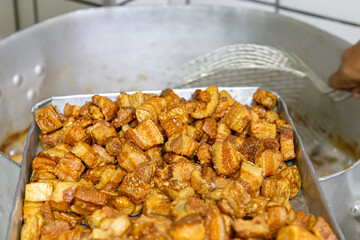 Torresmo. Fried pork belly. Traditional Brazilian food at Feijoada.