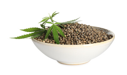 Bowl with hemp seeds and leaves on white background