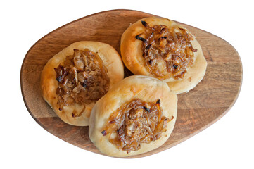 Tasty onion roll on wooden plate isolated on white background