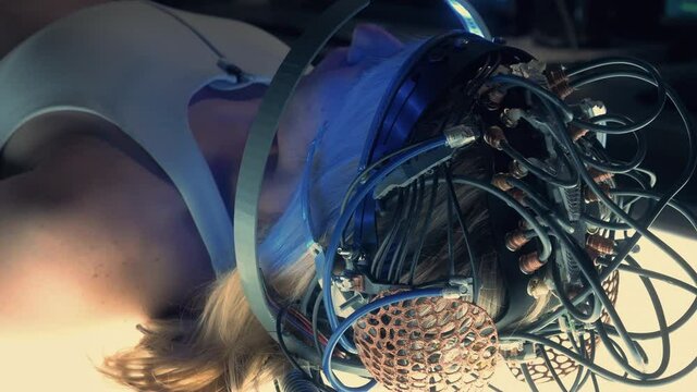 Close Up Shot of Brain Scan Headset. Female Patient Wearing Futuristic Neural Scanner on Her Head. Connecting Brain with Computer as Artificial Intelligence.
