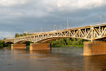 Fototapeta na wymiar The rail bridge over the Vistula River in Warsaw