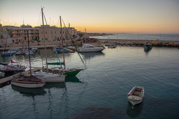 Fototapeta premium The old town and the harbor of Giovinazzo