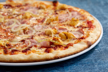 pizza on the wooden background