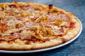 pizza on the wooden background