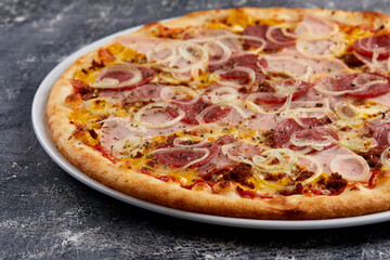 pizza on the wooden background
