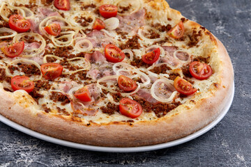 pizza on the wooden background