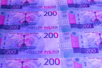 Fototapeta premium Russian money under ultraviolet light.