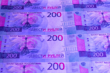 Russian money under ultraviolet light.