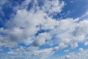 Naklejka na ściany i meble Blue color sky with white clouds. Nature background