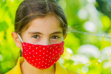 Little girl with mask