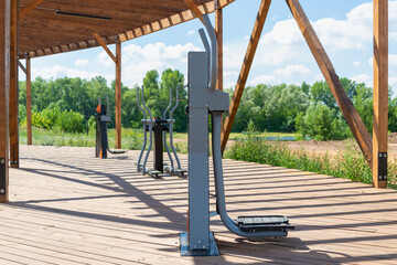Outdoor sports equipment under a canopy. In the park.