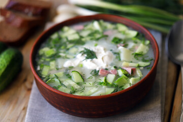 Okroshka. Summer cold soup in a bowl. Slavic cuisine.