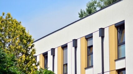 The glazed facade of an office building with reflected sky. Modern architecture buildings exterior background.