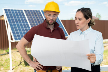 Team Discussing Solar Panels