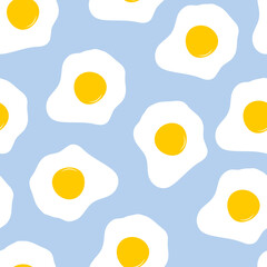 Fried egg seamless pattern on blue background.