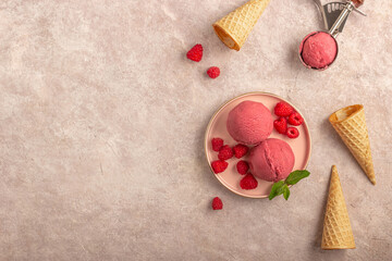 Fototapeta na wymiar Raspberry ice cream in white bowl close up