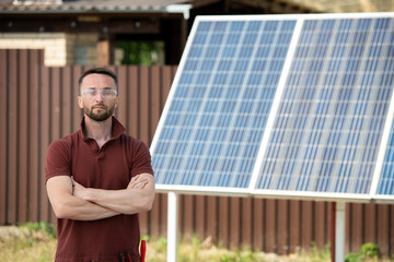 Man Standing against Solar Panel