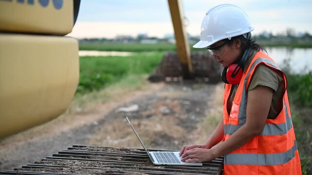 Environmental engineers work at the water storage plant, check the pH of the water, check the quality of the water