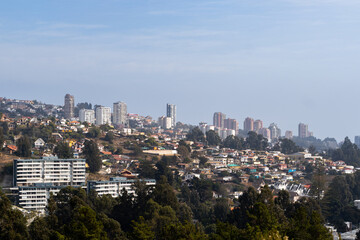 City between mountains with colorful houses