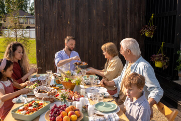 Big Family Eating Tasty Food