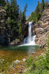 Beautiful Running Eagle Falls waterfall in the Two Medicine Area of Glacier National Park Montana