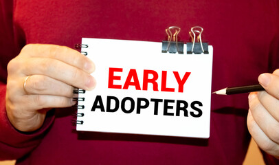 Business Term Business Phrase. text Early Adopters on white paper