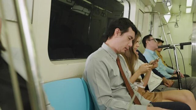 Passengers in the subway are sleeping tired after a day off from work, urban concept
