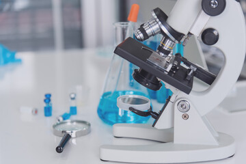 Microscope and test tubes in laboratory  and laboratory tools in reseach laboratory