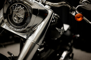 Obraz premium Detail of a stylish motorcycle with matte chrome finish