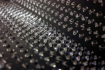 Elegant pendant lamp with many balls in a living room