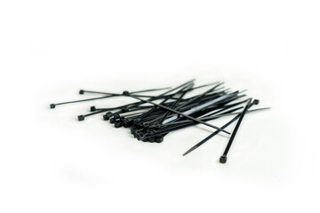 Black cable tie on isolate white background.