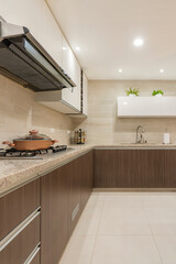 Fototapeta premium Countertop and worktop with built-in stove and extractor hood.