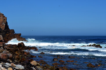 waves crashing on rocks