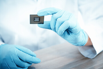 Electronic Lab Science and Manufacturing Computer Processor Concept, Engineer CPU Microchip Development Holding Circuit CPU for Examination Damage in Laboratory. Engineering Microprocessor Motherboard