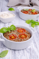Buckwheat casserole with tomatoes