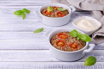 Buckwheat casserole with tomatoes