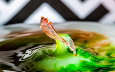 Water Droplet in a Pool of Water