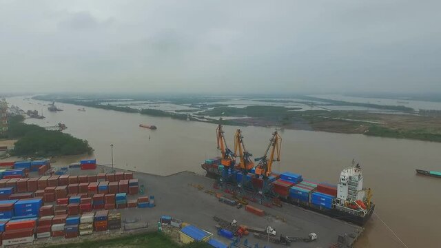 Cargo ships in a port of Hai Phong, Vietnam. Hai Phong port is one of the two biggest ports in Vietnam. (aerial photography)