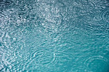 Blue clear fresh Water in jacuzzi. Spa massage background.