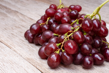 bunch of red grapes on the table