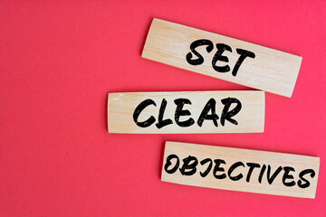 Text sign showing Set clear objectives