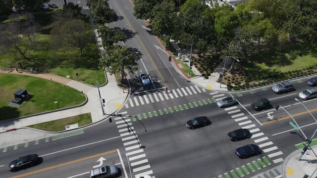 Beverly Hills, Los Angeles, California USA. Aerial View of Traffic at Boulevard Intersection on Sunny Day, Birdseye Drone Shot
