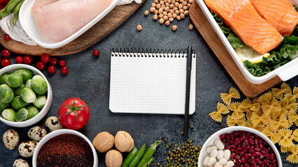 Healthy eating plan. Diet and meal planning on dark gray background.