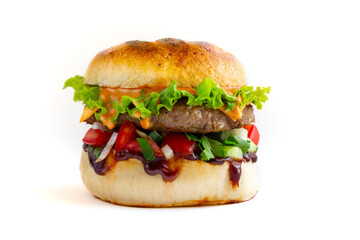 Fresh tasty burger with pork, salad and cheesee, sauces on white background. Fat unhealthy street food.