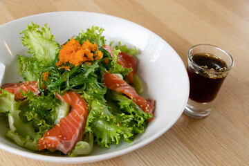 salmon salad japanese style with Sesame Dressing.Fusion food.
