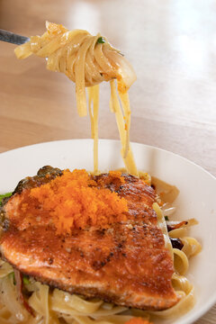 pasta steak salmon top shrimp roe.Fusion food.